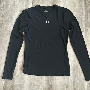 Women’s Under Armour v neck shirt. Size
medium.